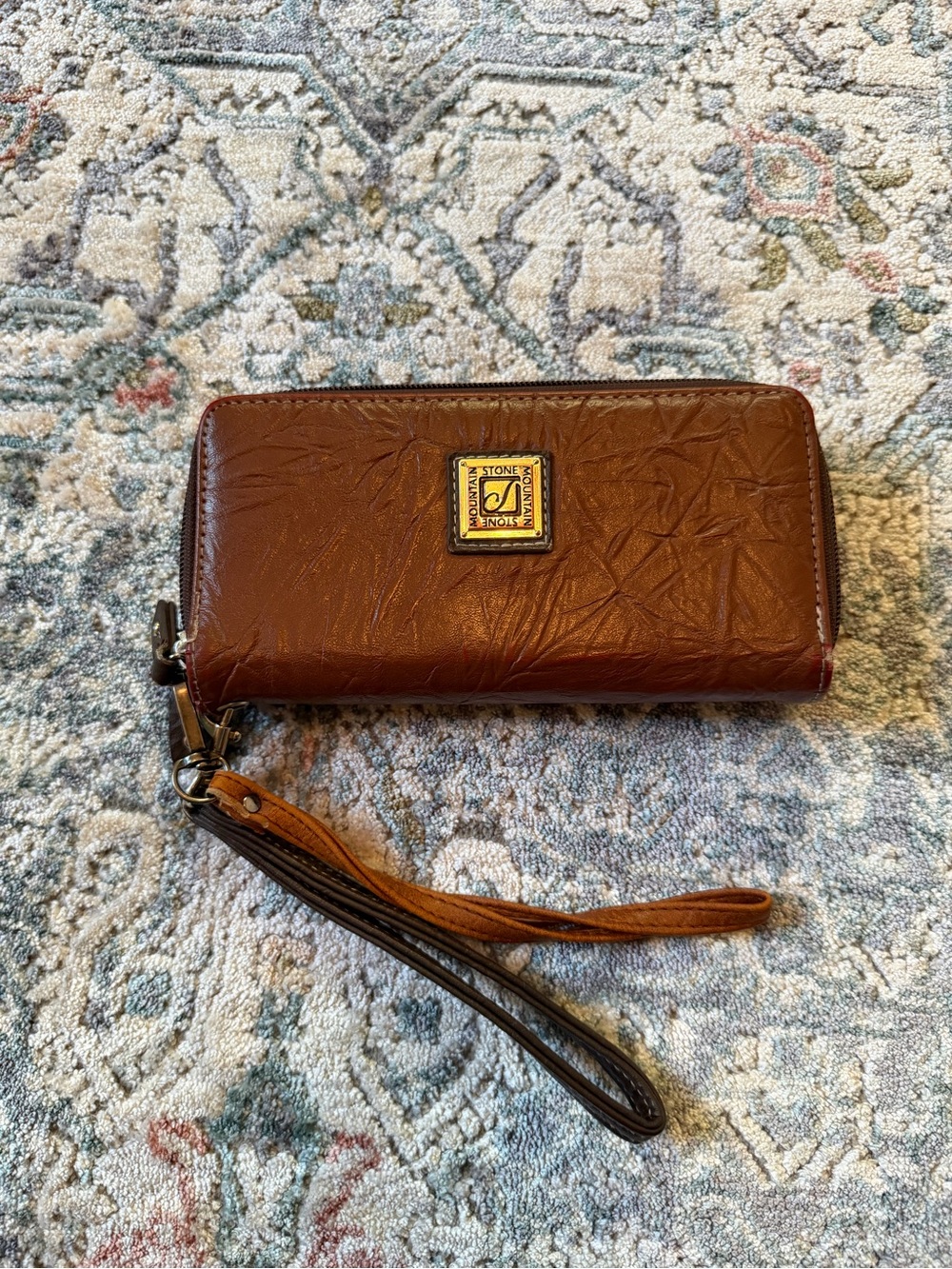 Stone Mountain Brown Zip Around Wristlet Wallet Embossed Floral Logo